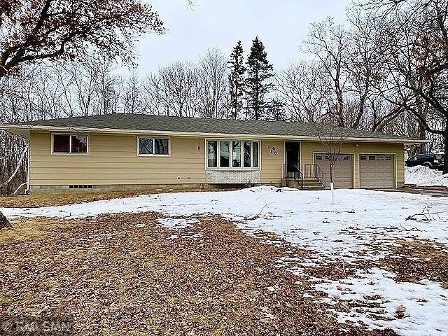single story home featuring a garage