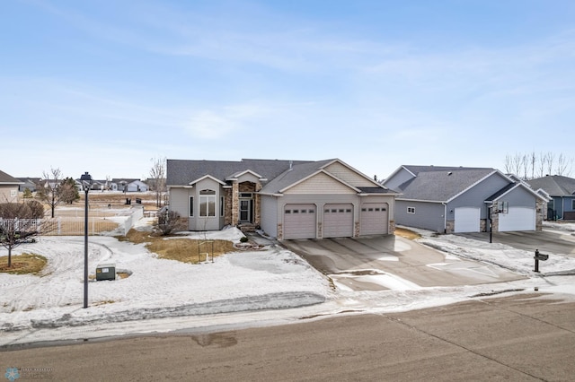 view of front of property with a garage, stone siding, a residential view, and concrete driveway