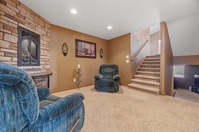 living area with baseboards, stairway, carpet flooring, a fireplace, and recessed lighting