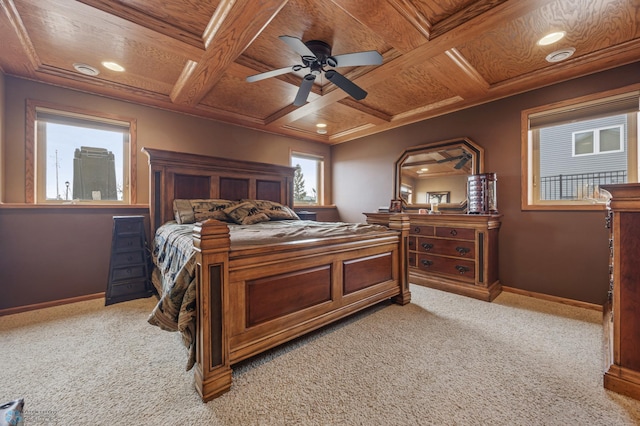 bedroom with light colored carpet, wood ceiling, coffered ceiling, and baseboards