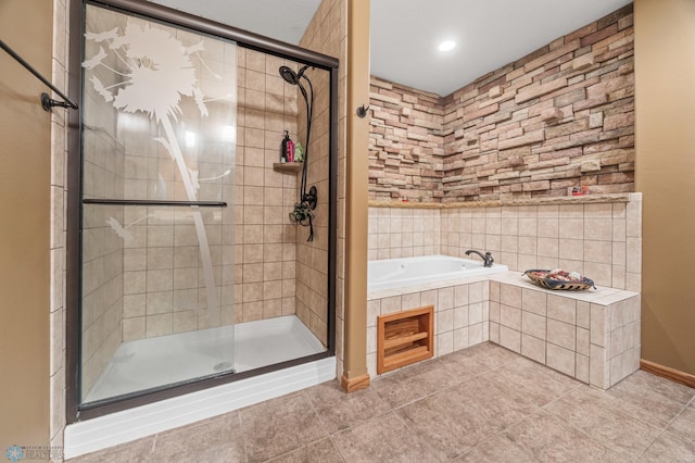 full bath featuring a stall shower, tile patterned flooring, and a garden tub