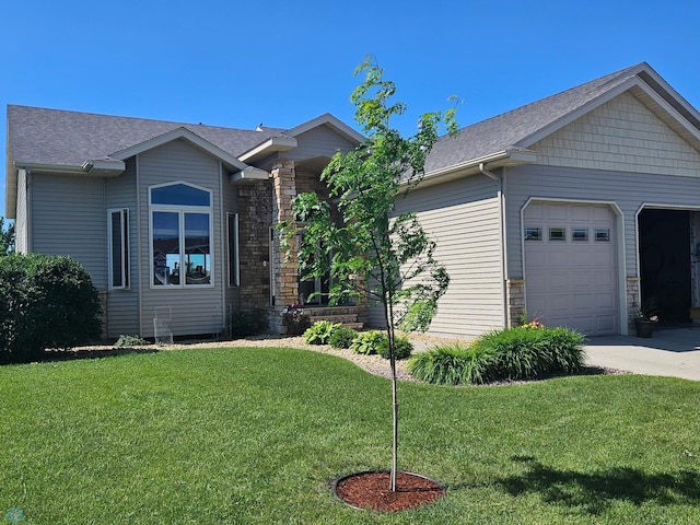 single story home featuring stone siding, roof with shingles, an attached garage, and a front lawn