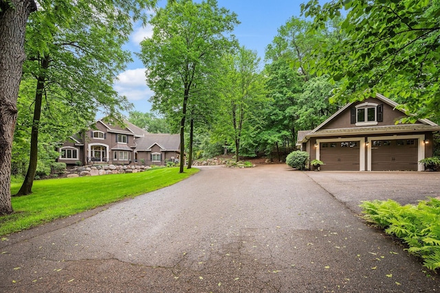 6155 Murray Ct, Shorewood, MN 55331 - view of front of home featuring a front yard and a garage