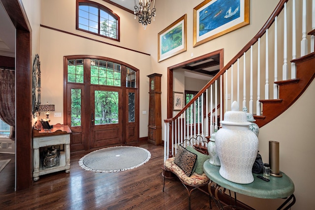 6155 Murray Ct, Shorewood, MN 55331 - entrance foyer with a high ceiling, wood finished floors, stairway, and a chandelier