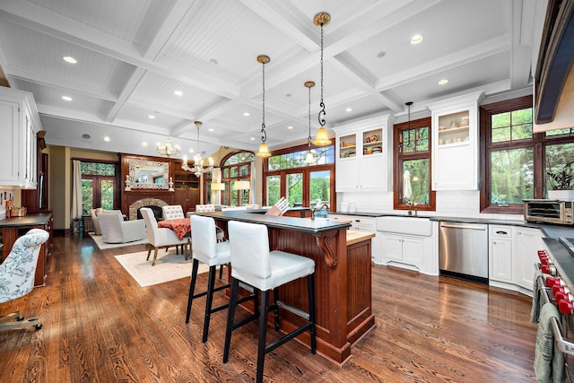 6155 Murray Ct, Shorewood, MN 55331 - kitchen with appliances with stainless steel finishes, coffered ceiling, dark wood-style floors, a chandelier, and white cabinetry