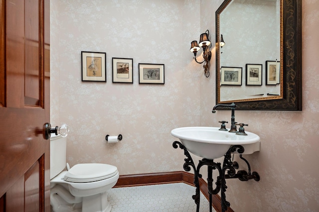 6155 Murray Ct, Shorewood, MN 55331 - bathroom featuring toilet and baseboards