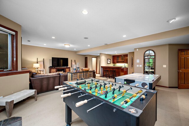 6155 Murray Ct, Shorewood, MN 55331 - game room with light carpet, bar, and recessed lighting