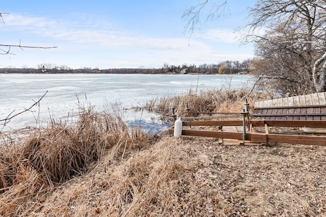 property view of water with fence