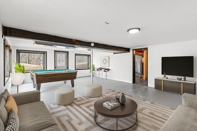 game room featuring finished concrete floors, a healthy amount of sunlight, billiards, and visible vents