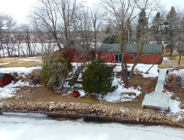 43404 Bills Beach Rd, Edna Twp, MN 56528 - snowy yard featuring stairway