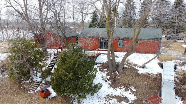 43404 Bills Beach Rd, Edna Twp, MN 56528 - yard layered in snow with stairway