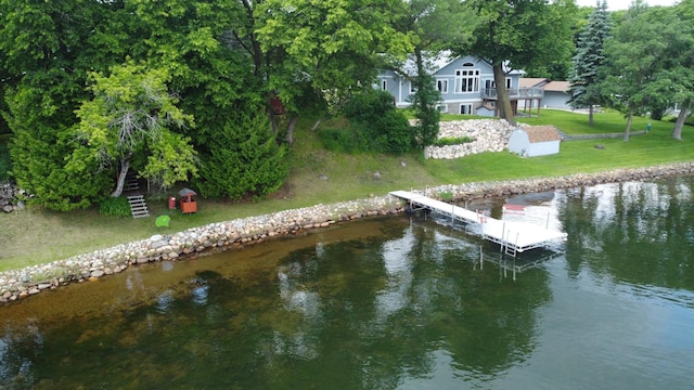 43404 Bills Beach Rd, Edna Twp, MN 56528 - dock featuring stairway, a water view, and a yard