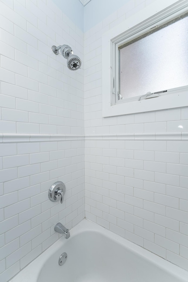 full bath featuring shower / bathing tub combination