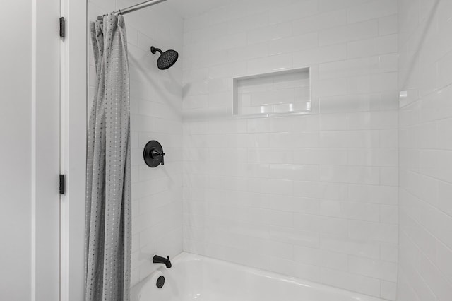 full bathroom featuring shower / tub combo with curtain