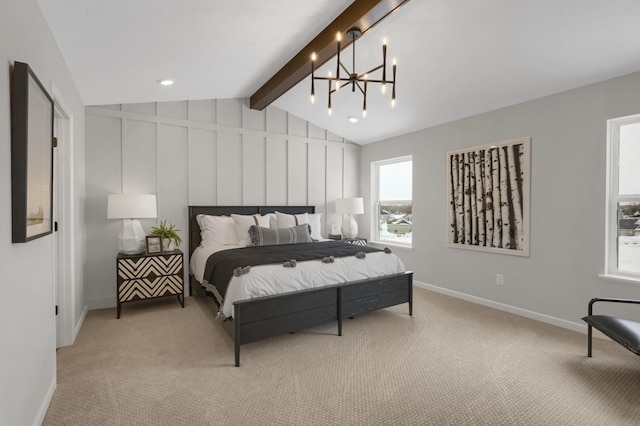 carpeted bedroom featuring lofted ceiling with beams, baseboards, and a chandelier