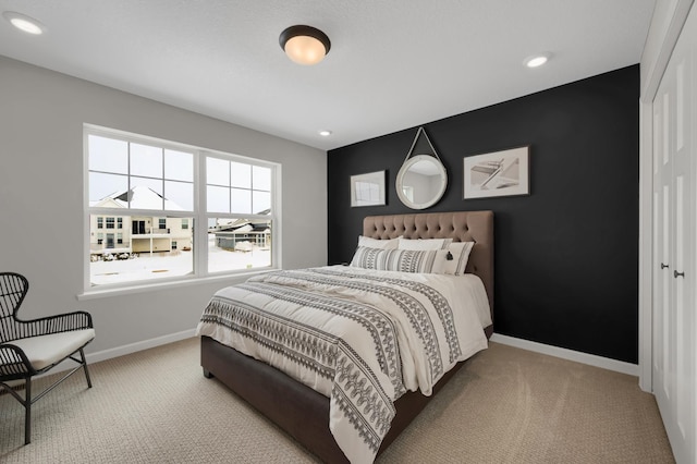 bedroom featuring carpet, baseboards, and recessed lighting