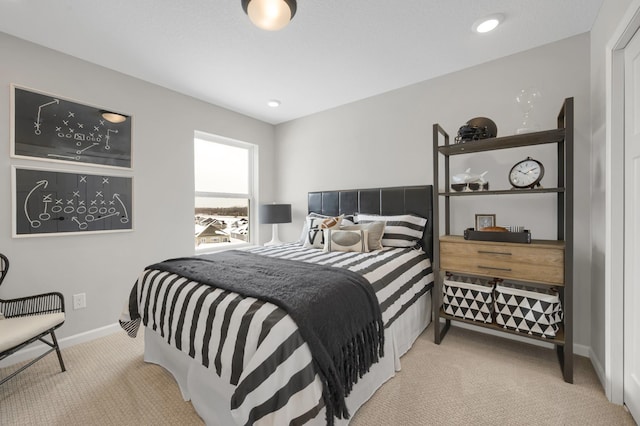 carpeted bedroom with recessed lighting and baseboards