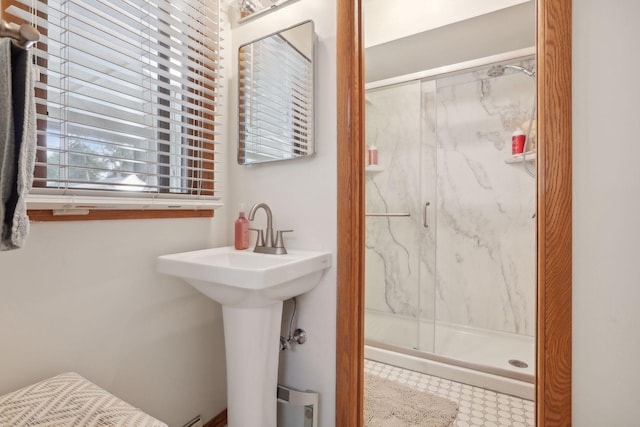 full bathroom featuring a marble finish shower