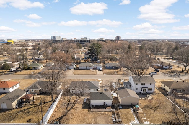 birds eye view of property with a residential view