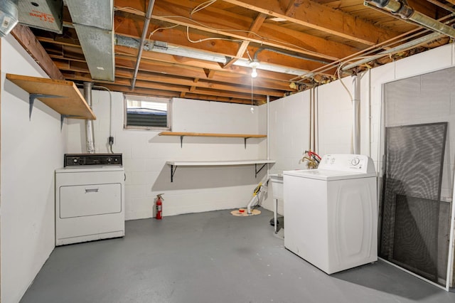 basement featuring washer and clothes dryer