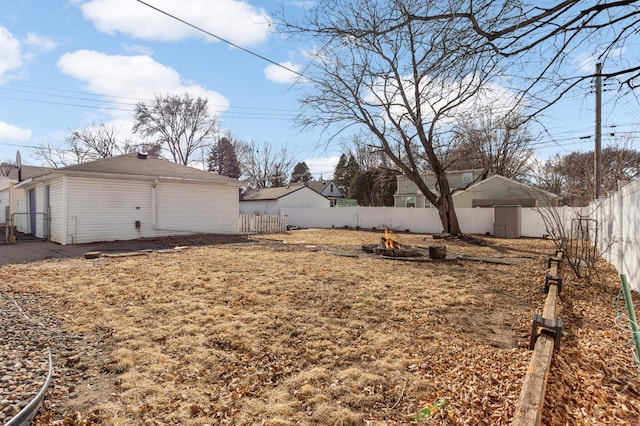 view of yard with a fenced backyard