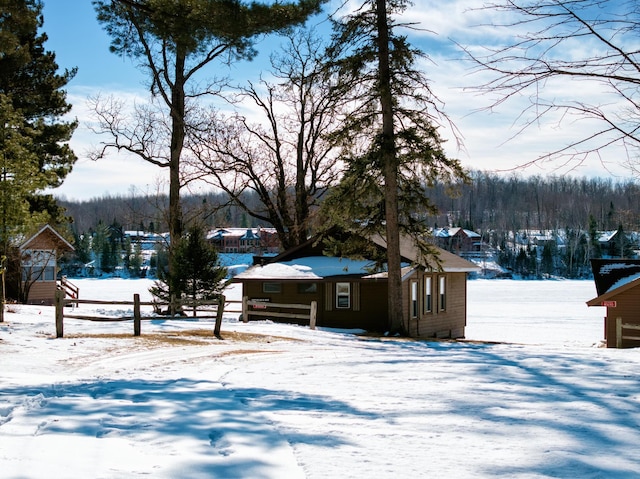 view of yard layered in snow