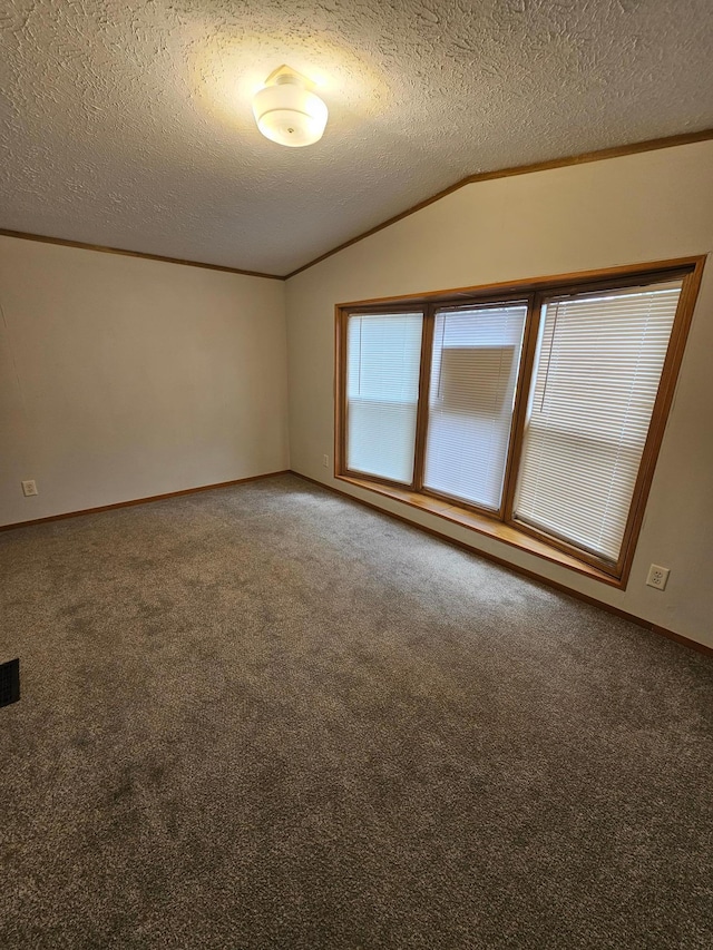 5 Orleans Ave, Inver Grove Heights, MN 55076 - carpeted spare room featuring vaulted ceiling, a textured ceiling, ornamental molding, and baseboards