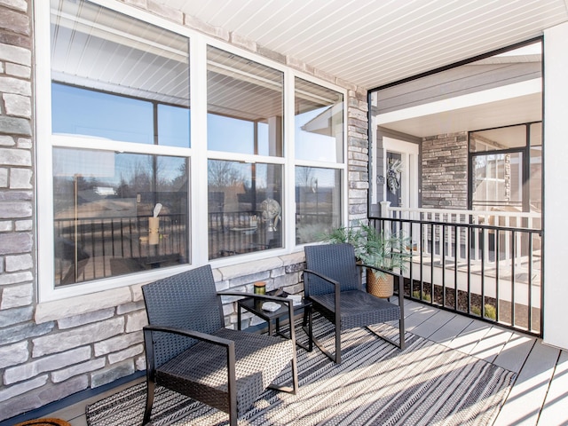 wooden deck featuring a porch