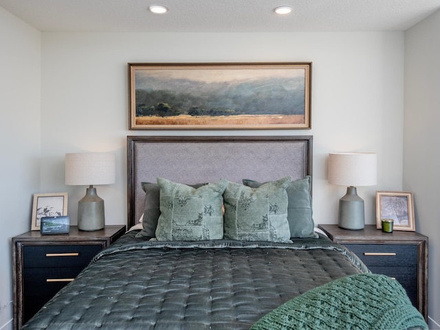 bedroom with recessed lighting