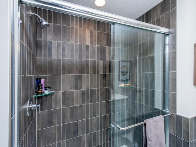 full bath featuring a stall shower