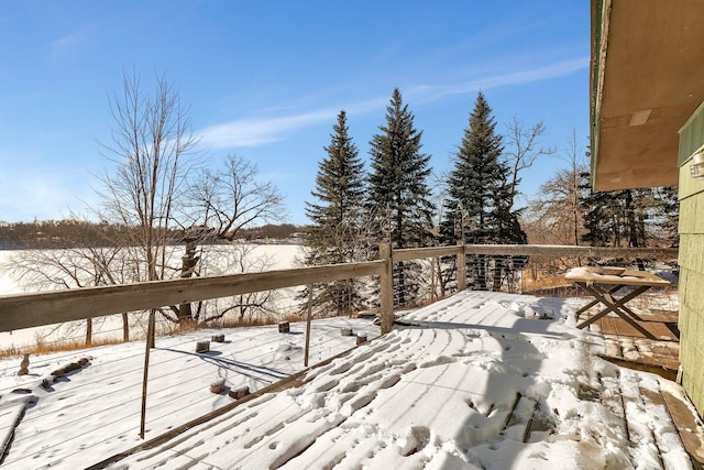 view of snow covered deck