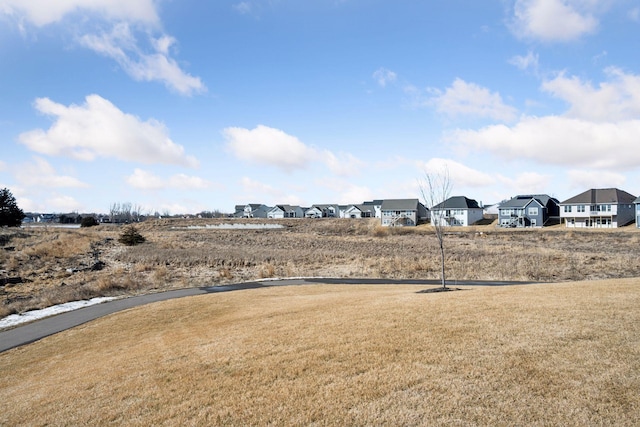 view of yard with a residential view