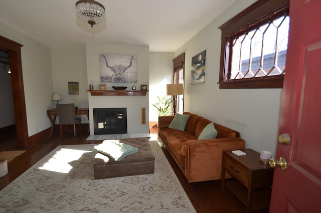 28 Saint Albans St N Unit 4N, Saint Paul, MN 55104 - living area featuring wood finished floors and a fireplace with flush hearth