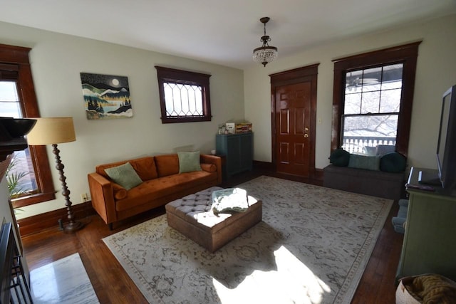 28 Saint Albans St N Unit 4N, Saint Paul, MN 55104 - living room with dark wood-style floors, healthy amount of natural light, and baseboards
