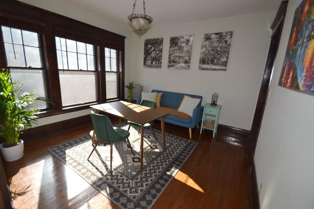 28 Saint Albans St N Unit 4N, Saint Paul, MN 55104 - dining area with baseboards and wood finished floors