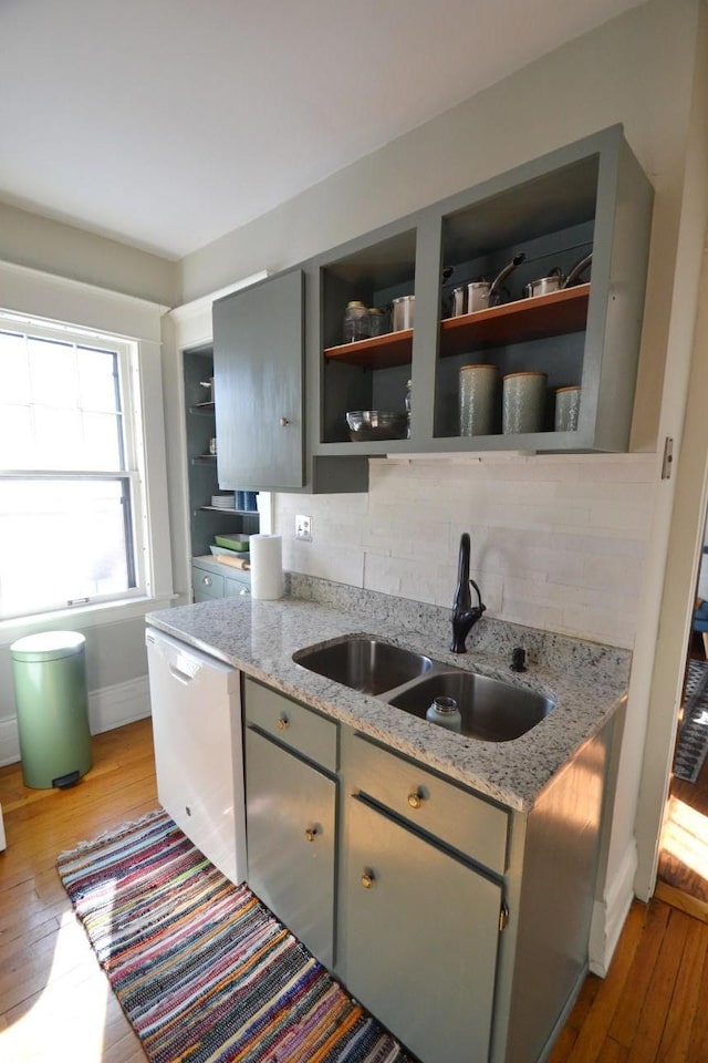 28 Saint Albans St N Unit 4N, Saint Paul, MN 55104 - kitchen featuring open shelves, a sink, white dishwasher, and gray cabinets