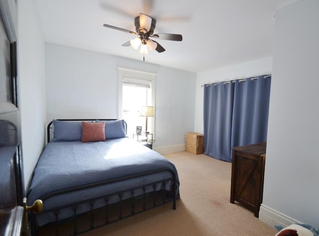28 Saint Albans St N Unit 4N, Saint Paul, MN 55104 - bedroom with light carpet, ceiling fan, and baseboards