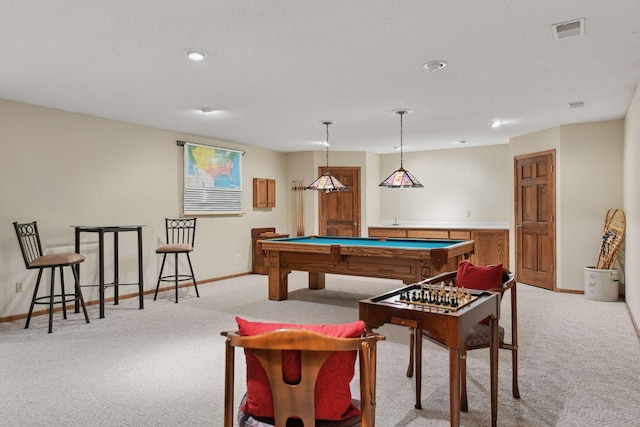 rec room with baseboards, pool table, visible vents, and light colored carpet