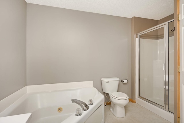 bathroom with a whirlpool tub, a textured ceiling, a shower stall, and toilet