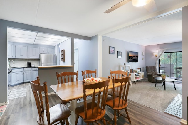 dining area featuring wood finished floors