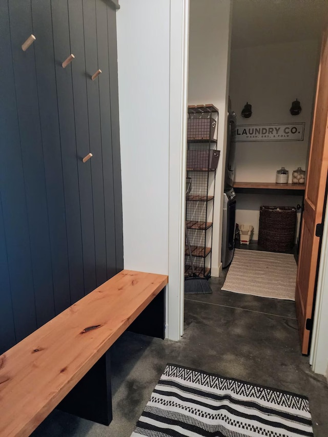 mudroom featuring concrete floors