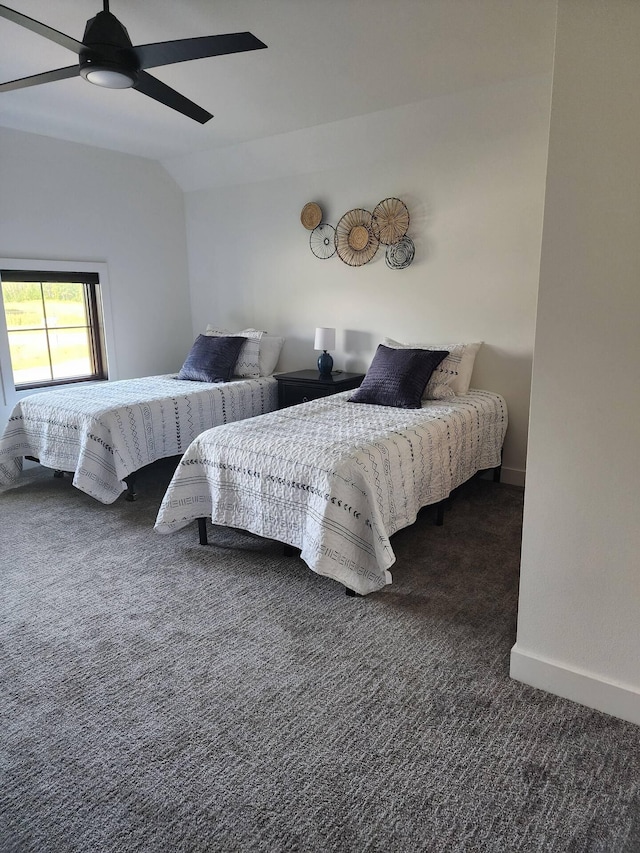 carpeted bedroom featuring ceiling fan, baseboards, and vaulted ceiling