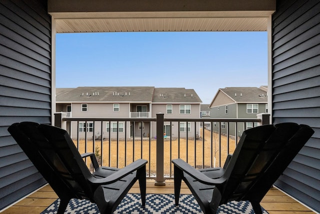 balcony featuring a residential view