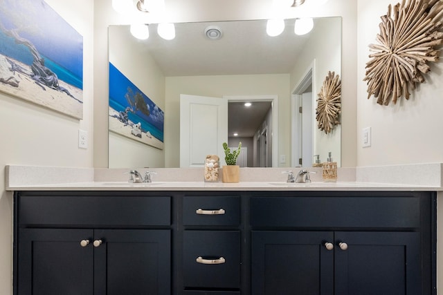 bathroom with double vanity and a sink