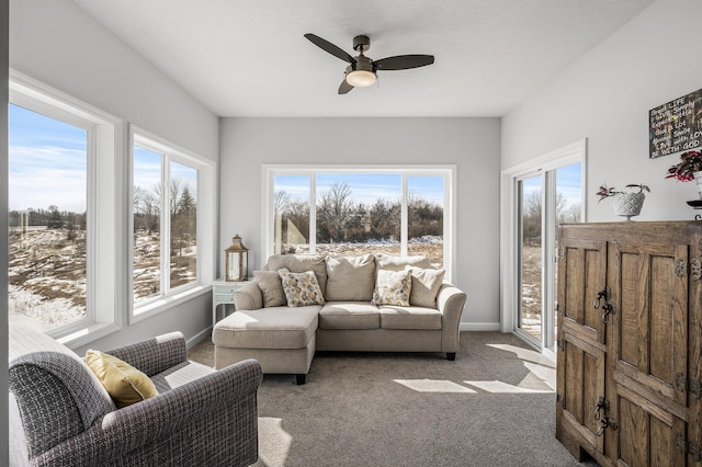 sunroom / solarium with ceiling fan