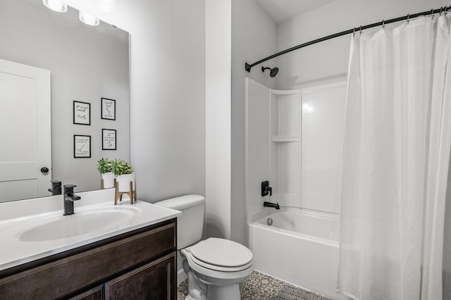 bathroom with shower / tub combo, vanity, and toilet