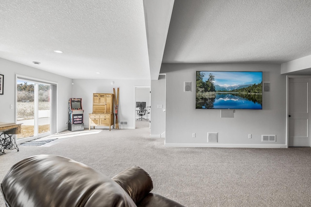 living room featuring carpet, visible vents, and baseboards