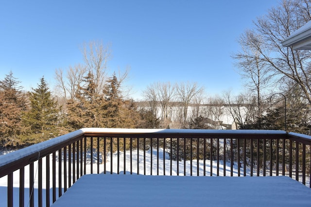 view of snow covered deck