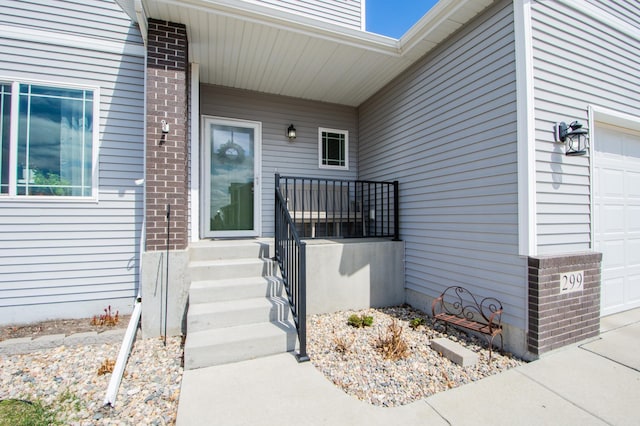 property entrance featuring a garage
