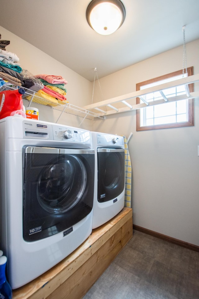 washroom featuring laundry area and washer and clothes dryer